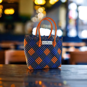 TLBAS-0010/Elegantly Crafted Vangi cross-knot design basket