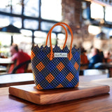 TLBAS-0010/Elegantly Crafted Vangi cross-knot design basket