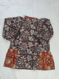 Floral patterned fabric piece on a white background
